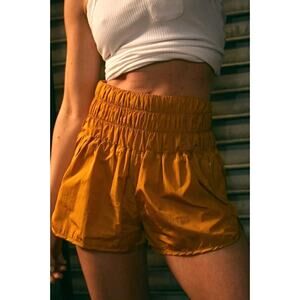 Free People FP Movement THE WAY HOME Shorts in Toasted Coconut Orange M NWOT